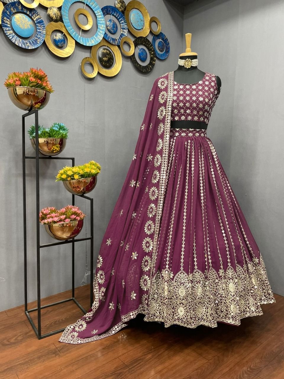 The reception lehenga for bride is styled with a full-sleeve blouse